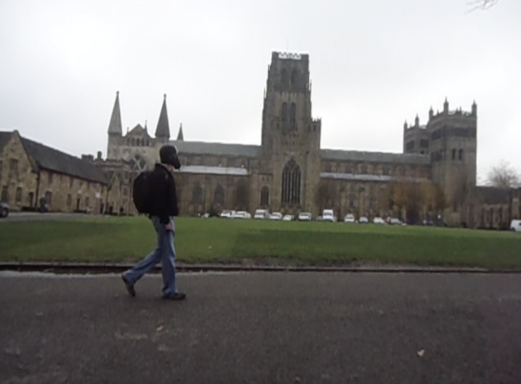 A man walks past Durham Catherdal