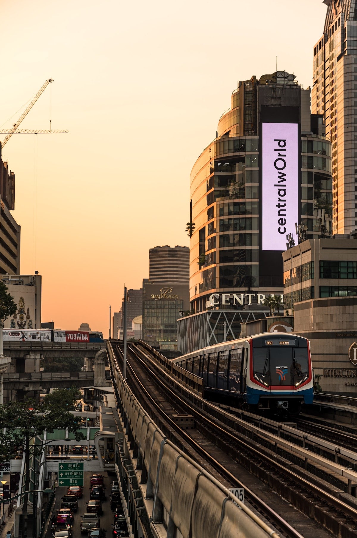 Cost of Living in Bangkok (& The Lies That Bloggers Tell) • BTS train Bangkok BTS train going past Central World in Bangkok, Thailand