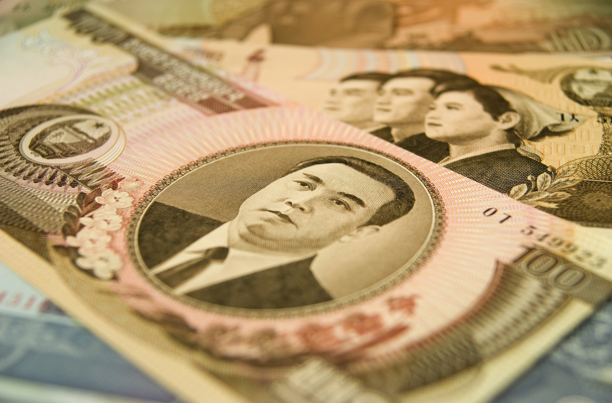 North Korean currency up close depicting images of their former leader, Kim Il-Sung, who was the leader of the Democratic People’s Republic of Korea until his death in 1994