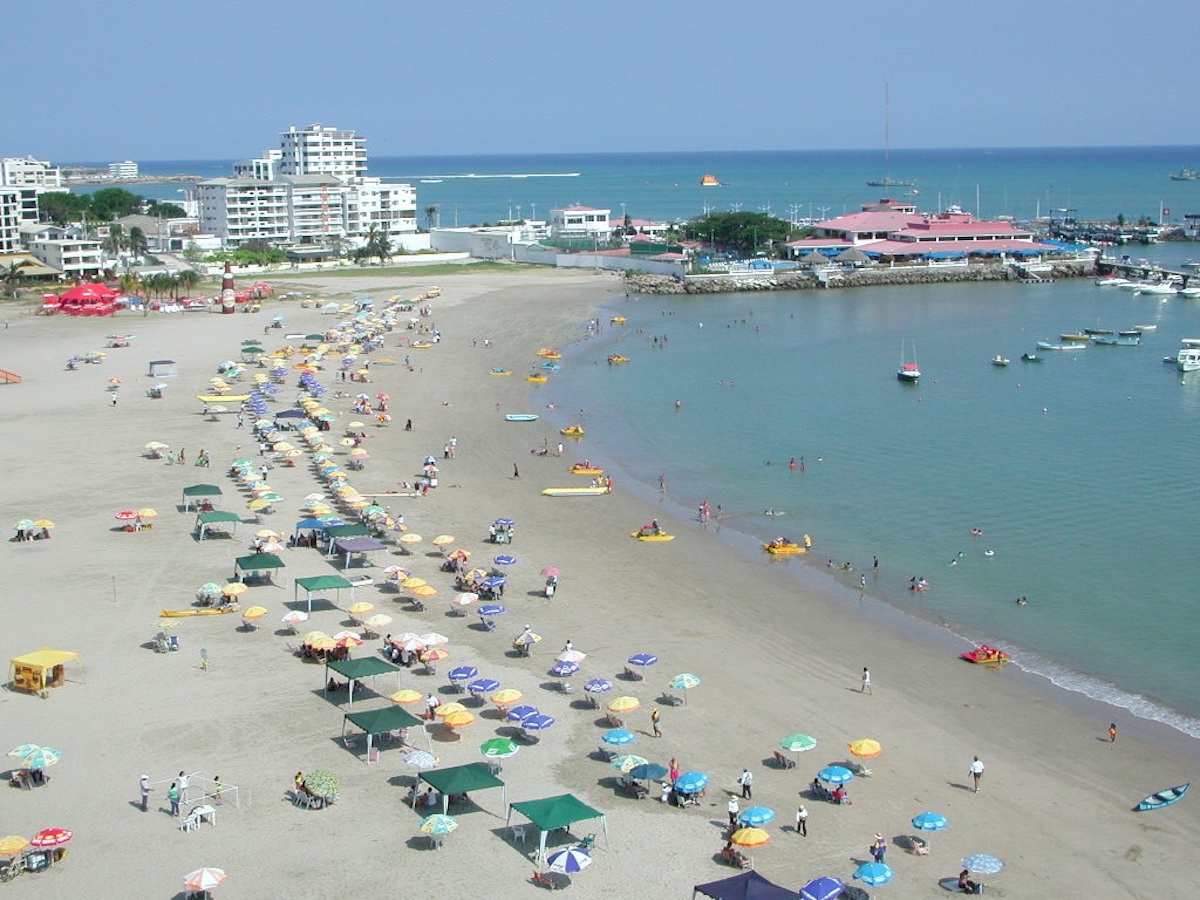 A packed beach on the coast of Ecuador